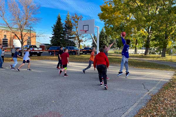 Crowther-Memorial-play-basketball