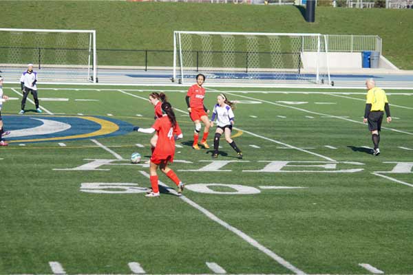 Holy-Names-Catholic-students-playing-football